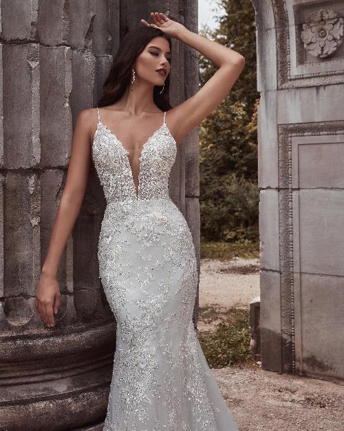 121104 fitted sparkly wedding dress with open back and spaghetti straps1
